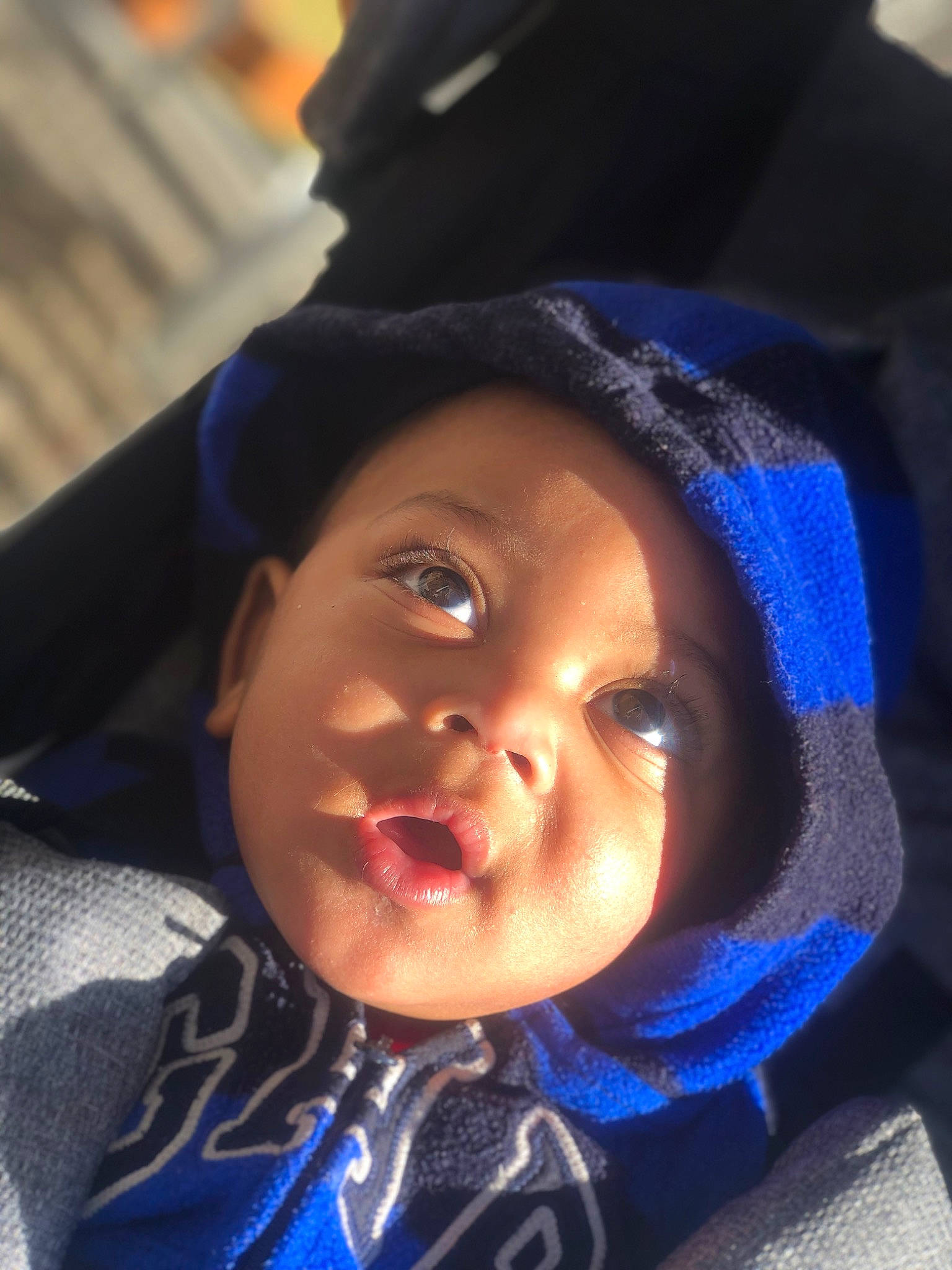 Josiah is registered to the contest to win money with this photo: black_hair, cap, cheek, cloud, cool, electric_blue, eyebrow, eyelash, fun, happy, headgear, headwear, iris, jaw, lip, mouth, nose, outerwear, person, personal_protective_equipment