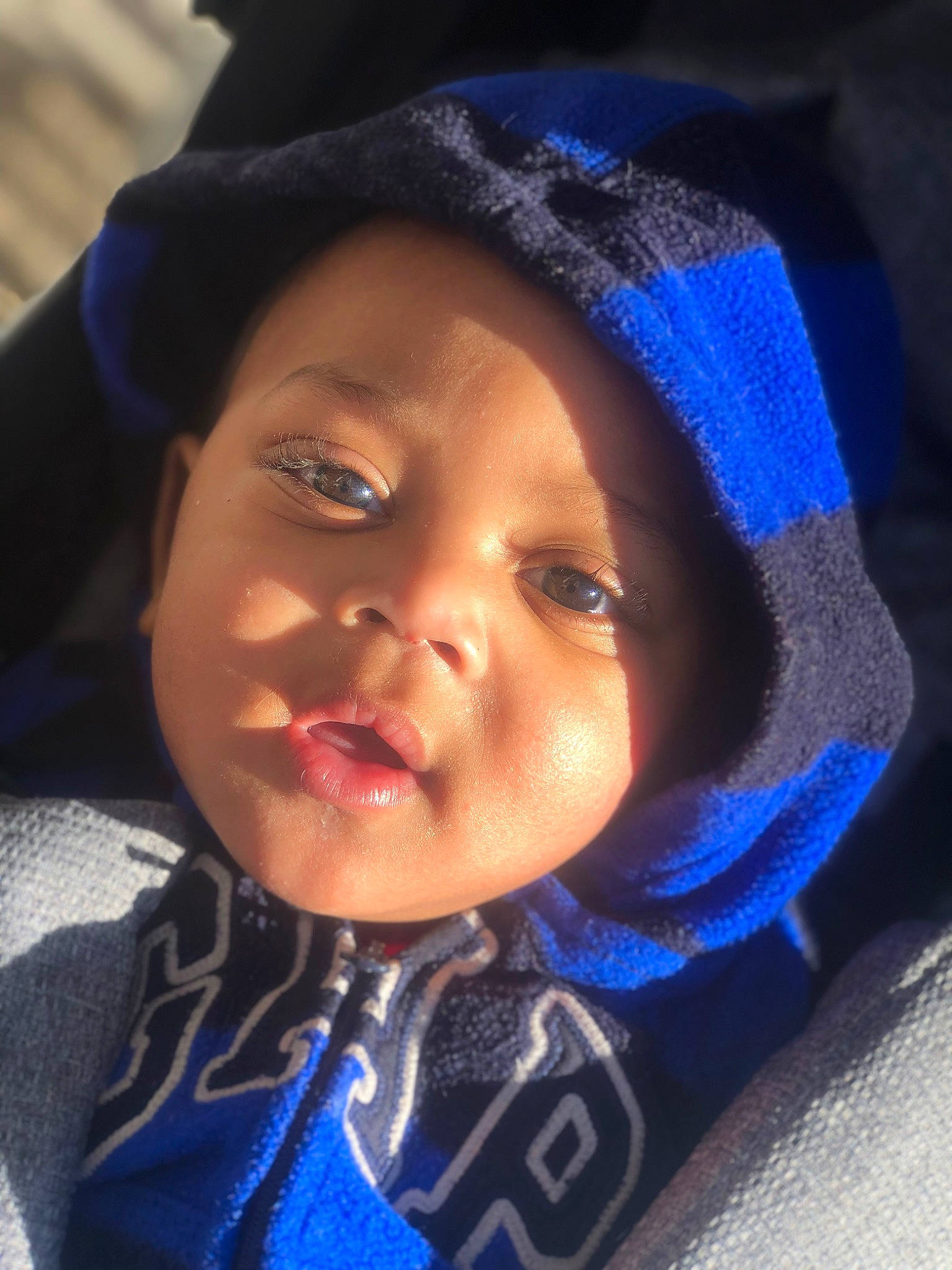 Josiah joined the competition — help win amazing prizes! baby, cap, cheek, chin, clothing, eye, eyebrow, facial_expression, happy, head, headgear, headwear, iris, lip, mouth, nose, organ, outerwear, person, purple