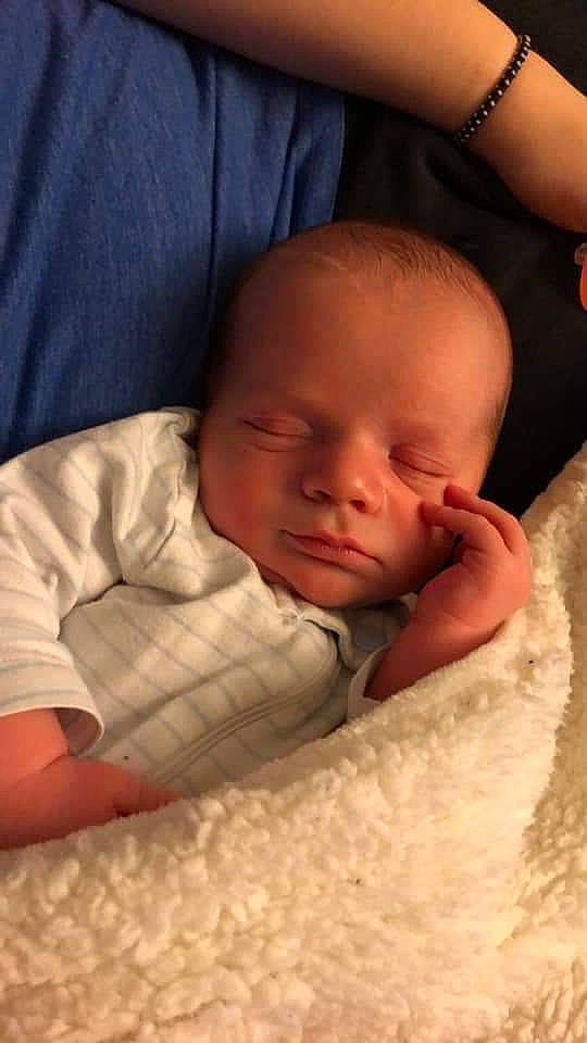 Gary is registered to the contest to win money with this photo: bedtime, cheek, child, ear, finger, forehead, girl, hand, head, infant, lip, mouth, nap, nose, person, skin, sleep, toddler