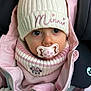 baby, blanket, bonnet, cap, car, car_interior, carseat, clothing, coat, face, happy, hat, head, hood, jacket, person, photography, portrait, transportation, vehicle