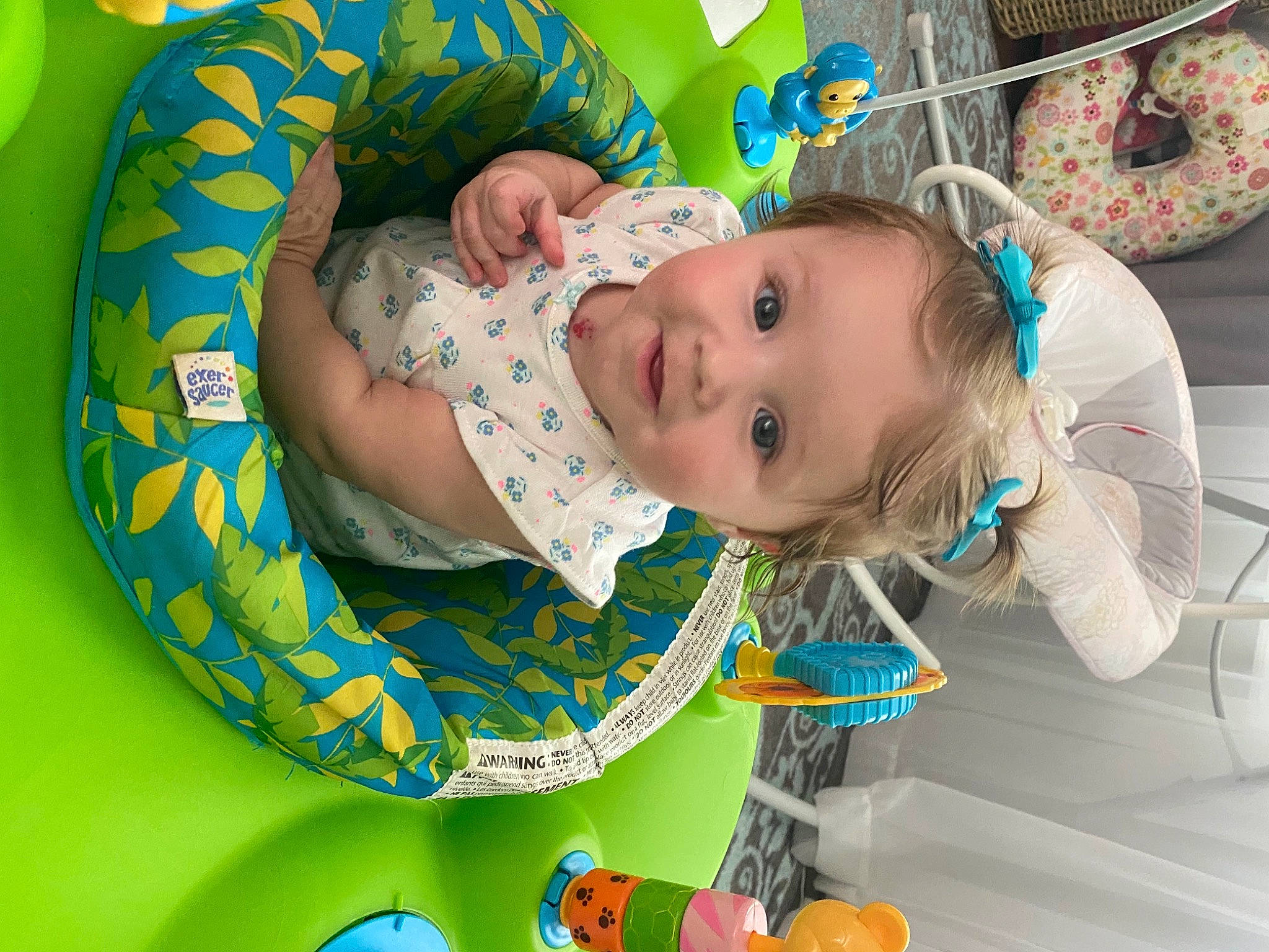 Emmi is registered to the contest to win money with this photo: baby, baby_laughing, baby_products, baby_safety, baby_toddler_clothing, baby_toys, child, circle, comfort, fun, green, happy, pattern, person, play, product, room, smile, toddler, toy