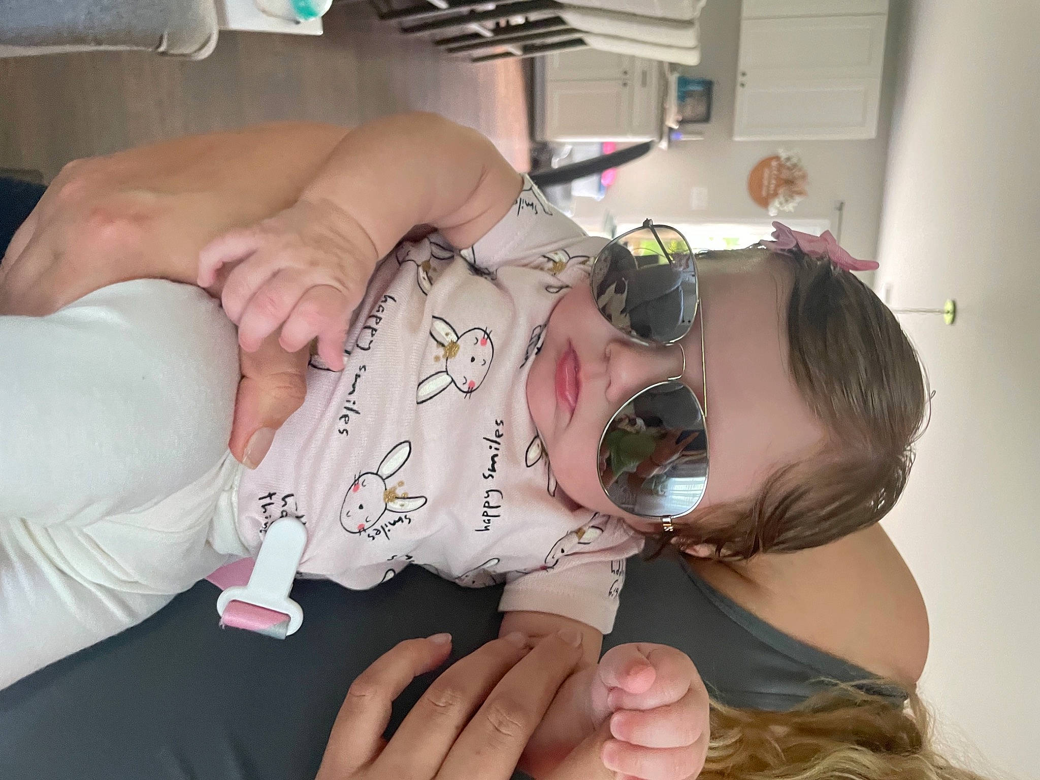 Emmi joined the competition — help win amazing prizes! baby, chest, child, comfort, event, eyelash, eyewear, finger, gesture, goggles, hand, happy, mouth, neck, person, room, sunglasses, thumb, toddler, vision_care