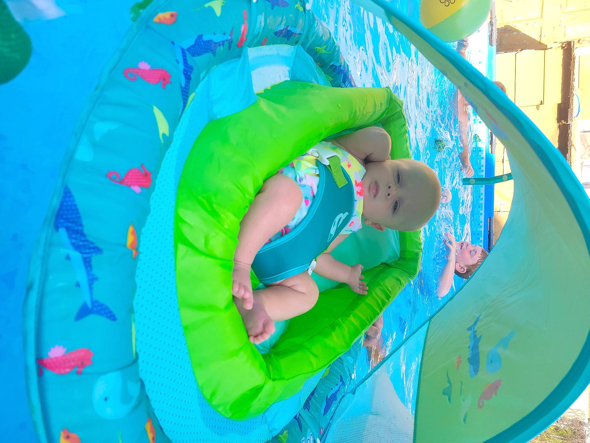 Brynleigh joined the competition — help win amazing prizes! aqua, baby, baby_toddler_clothing, blue, child, chute, comfort, electric_blue, fun, grass, happy, inflatable, leisure, outdoor_play_equipment, outdoor_recreation, person, play, product, recreation, t_shirt