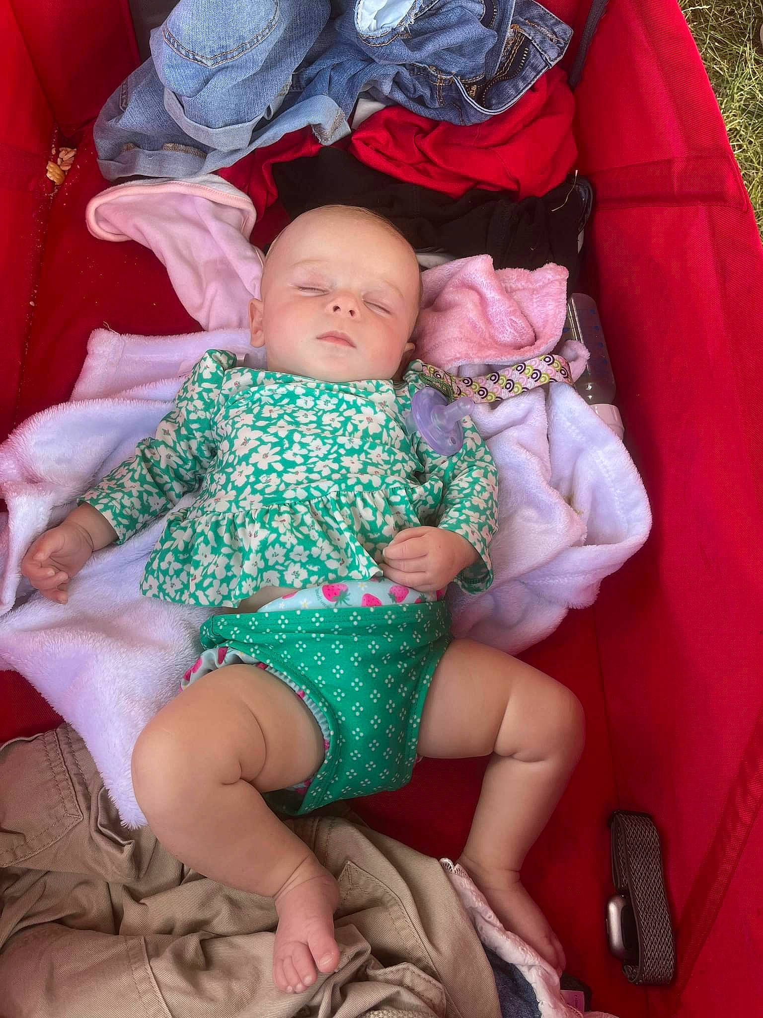 Brynleigh joined the competition — help win amazing prizes! baby, baby_toddler_clothing, cheek, child, comfort, eye, fun, grass, human_leg, lap, leg, magenta, pattern, person, pink, product, sitting, skin, textile, thigh