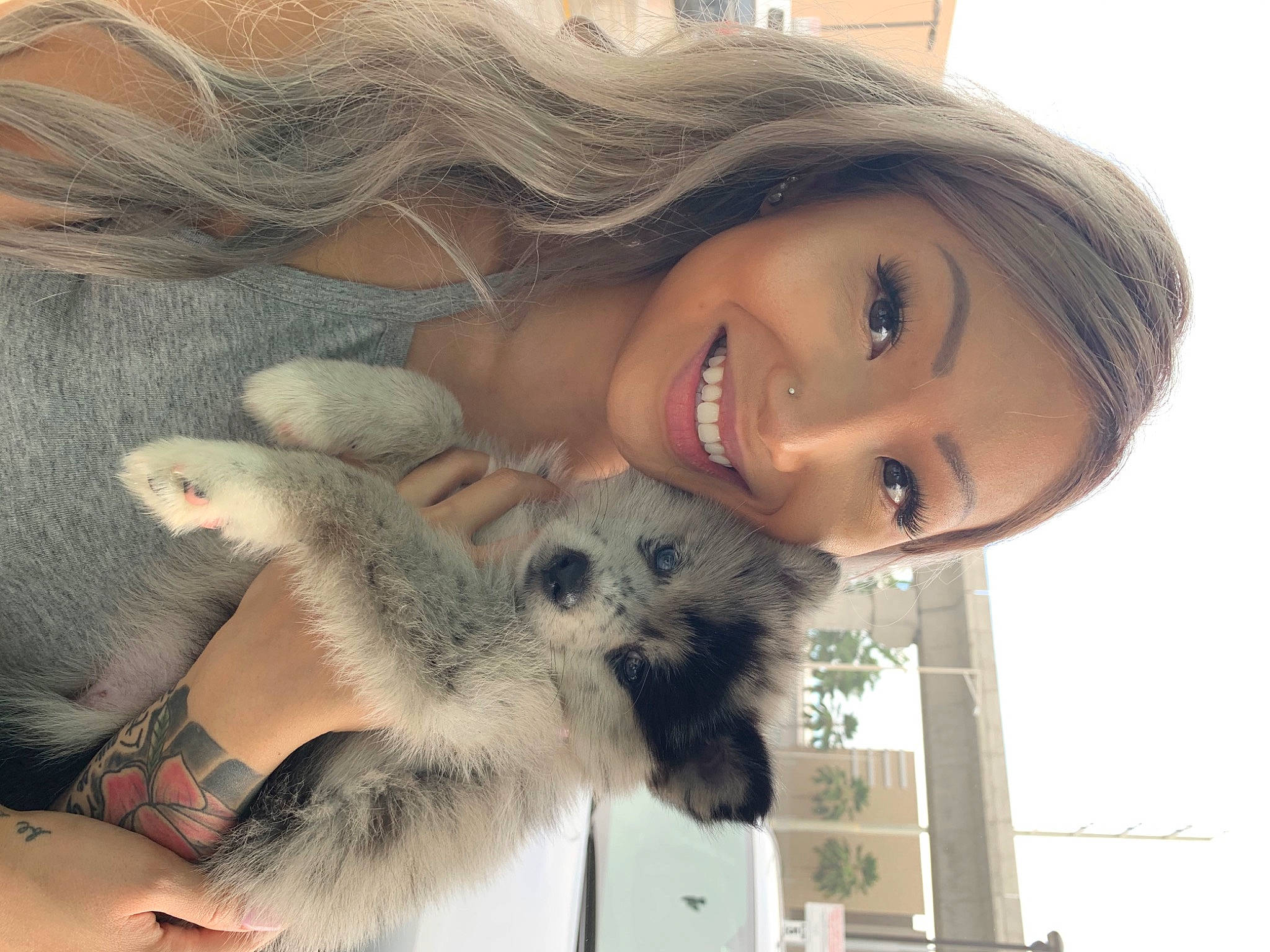 Galaxy is registered to the contest to win money with this photo: art, black_hair, companion_dog, dress, eyelash, fawn, gesture, hair, happy, head, iris, lip, mammal, nose, skin, smile, snapshot, toy, vertebrate, window