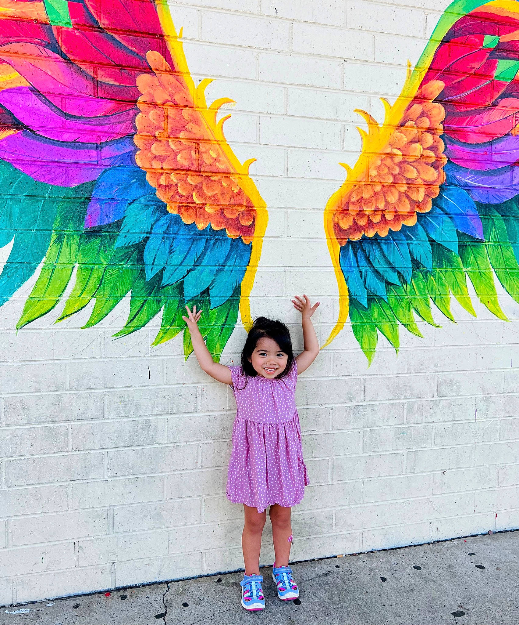 Shiloh is registered to the contest to win money with this photo: art, blue, face, feather, happy, joy, leaf, line, magenta, nature, organ, organism, outerwear, people_in_nature, person, photograph, pink, smile, summer, textile