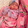 newborn, baby, sleeping, infant, portrait, face, pink, blanket, minnie_mouse, headband, clothing, cozy, cushion, indoors, nap, peaceful, cute, covered, textile, close_up