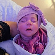Dasha Umana joined the competition — help win amazing prizes! newborn, baby, sleeping, portrait, face, hat, bow, purple, blanket, bundled, infant, closed_eyes, peaceful, indoors, bed, textile, clothing, parent, cozy, photography