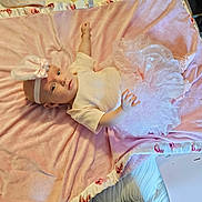 Izabella joined the competition — help win amazing prizes! baby, infant, pink_blanket, headband, bunny_ears, tutu, clothing, lying_down, soft_texture, bed, baby_girl, cute, face, person, portrait, indoors, decor, fabric, baby_accessory, resting