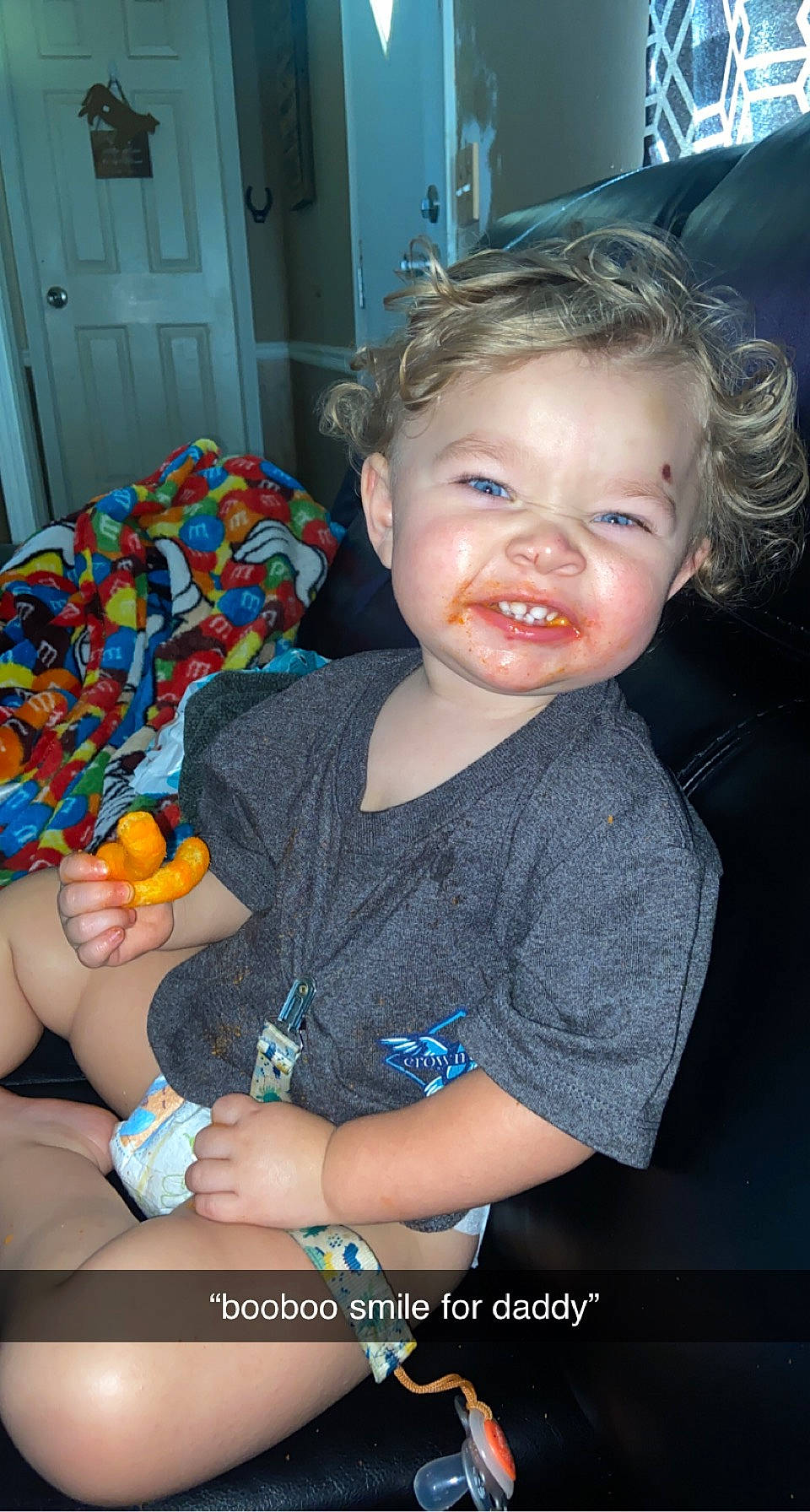 Briar is registered to the contest to win money with this photo: baby_playing_with_toys, baby_toddler_clothing, blue, chair, cheek, child, door, flash_photography, fun, hand, happy, lap, nail, person, sitting, skin, smile, stuffed_toy, t_shirt, toddler