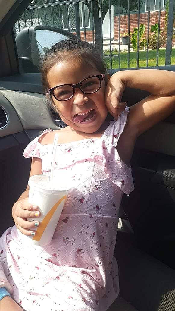 Melina joined the competition — help win amazing prizes! baby_toddler_clothing, cool, day_dress, dress, eyewear, finger, fun, gesture, glasses, hairstyle, hand, happy, human, joint, person, shoulder, sleeve, thumb, toddler, vehicle_door