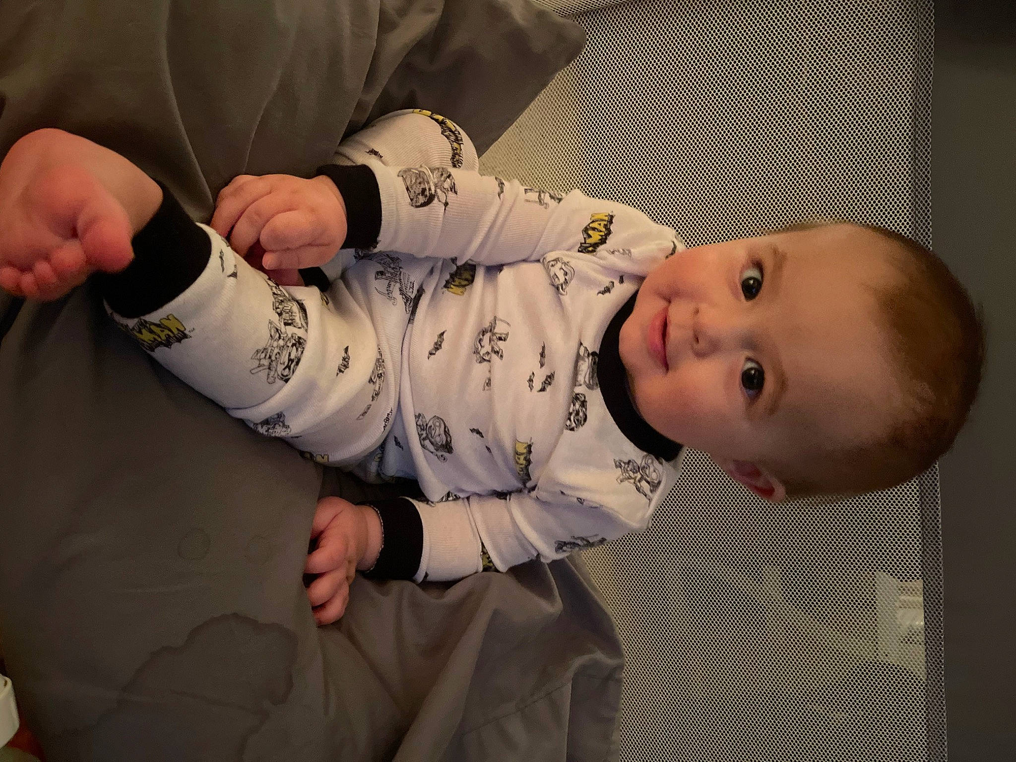 Jax is registered to the contest to win money with this photo: baby, baby_toddler_clothing, child, comfort, contact_sport, elbow, event, flooring, gesture, happy, human_body, knee, person, room, sitting, sleeve, smile, thigh, thumb, toddler