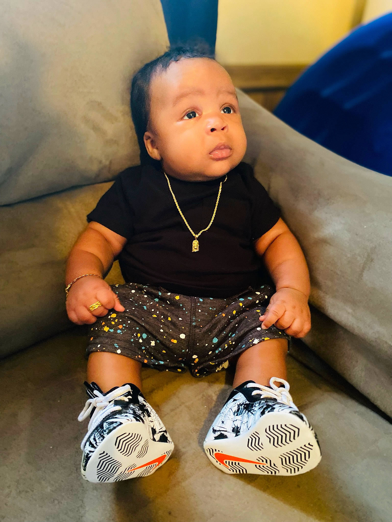 Ermias is registered to the contest to win money with this photo: baby, baby_toddler_clothing, blue, dress, electric_blue, eye, face, happy, head, human_body, human_leg, knee, leg, person, sleeve, sportswear, t_shirt, thigh, toddler, white