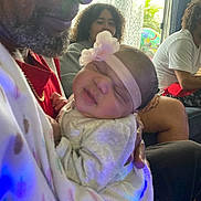 Serayah joined the competition — help win amazing prizes! baby, child, man, indoor, couch, curtains, window, headband, flower, people, family, seated, person, beard, clothing, toy, relaxing, portrait, light, smile