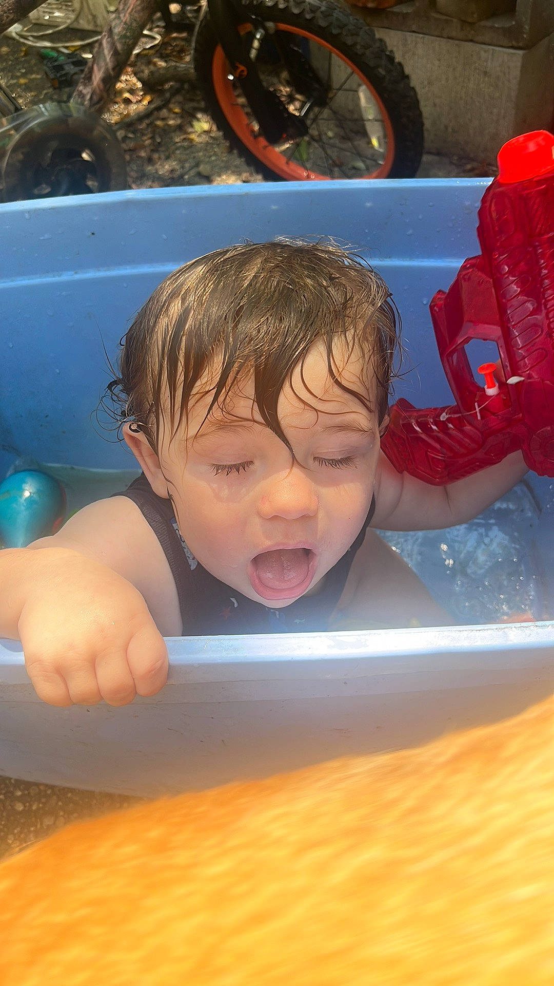 Tyrone joined the competition — help win amazing prizes! baby, baby_products, bathing, blue, child, flooring, fun, happy, head, leisure, organ, person, play, recreation, skin, swimming_pool, tire, toddler, tread, water