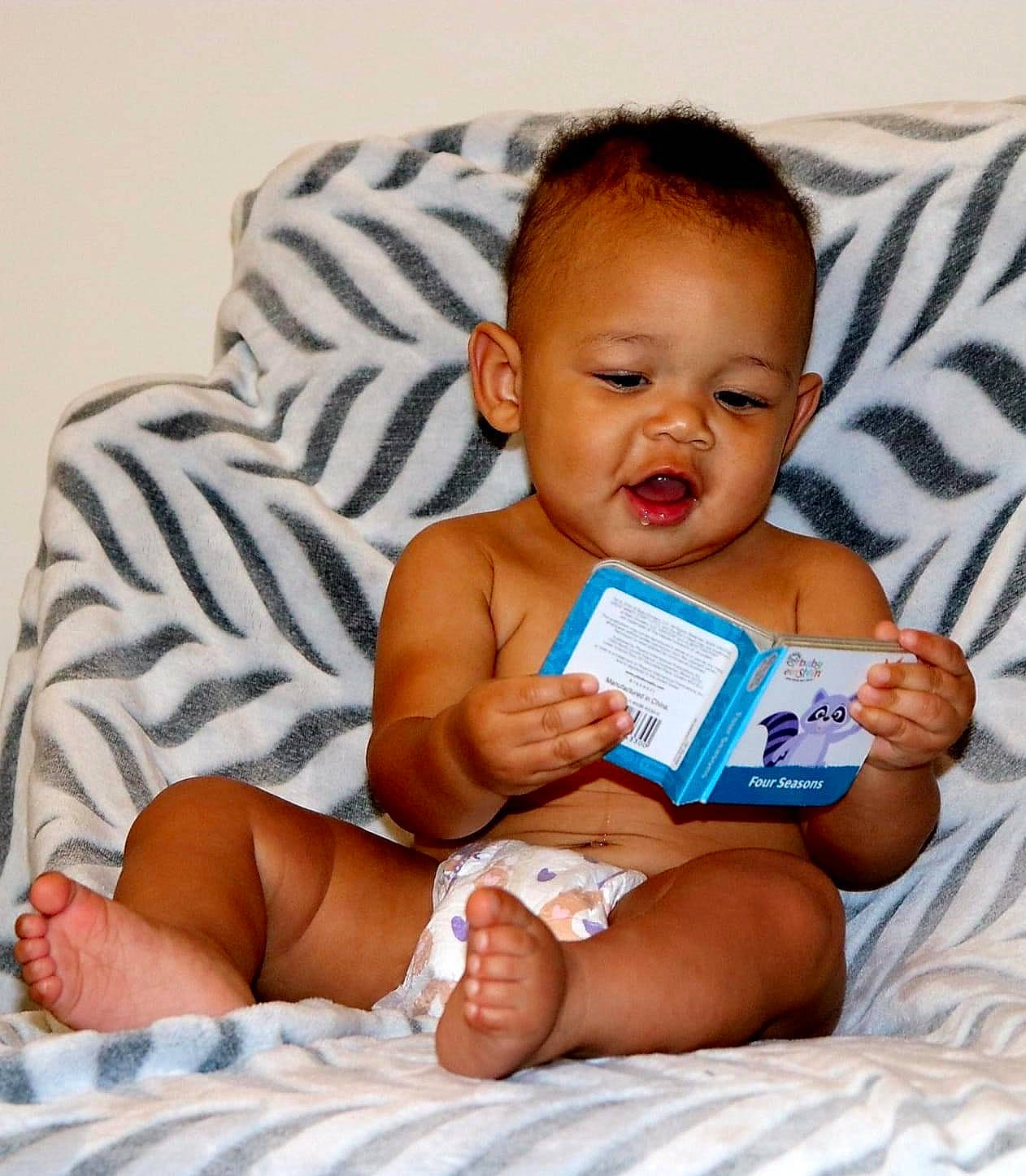 Prince is registered to the contest to win money with this photo: baby, baby_toddler_clothing, cheek, child, comfort, eye, face, facial_expression, finger, happy, human_body, iris, knee, muscle, person, product, skin, stomach, thigh, thumb