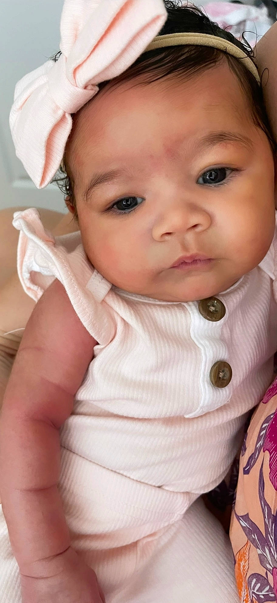 Amor joined the competition — help win amazing prizes! baby, baby_toddler_clothing, cheek, dress, ear, eye, eyebrow, eyelash, finger, gesture, hand, human_body, iris, lip, mouth, nose, person, pink, skin, sleeve