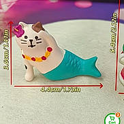 Spark joined the competition — help win amazing prizes! figurine, cat, mermaid_tail, ceramic, flower, necklace, measurement, table, product_photo, shopping_app, decorative, small_object, toy, closeup, white_surface, purple_background, ornament, cute, accessory, display