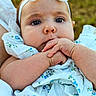 Taverly-Rose is registered to the contest to win money with this photo: baby, child, infant, headband, bow, floral_dress, hand, face, skin, outdoor, portrait, cute, young, person, closeup, expression, clothing, summer, nature, soft_light