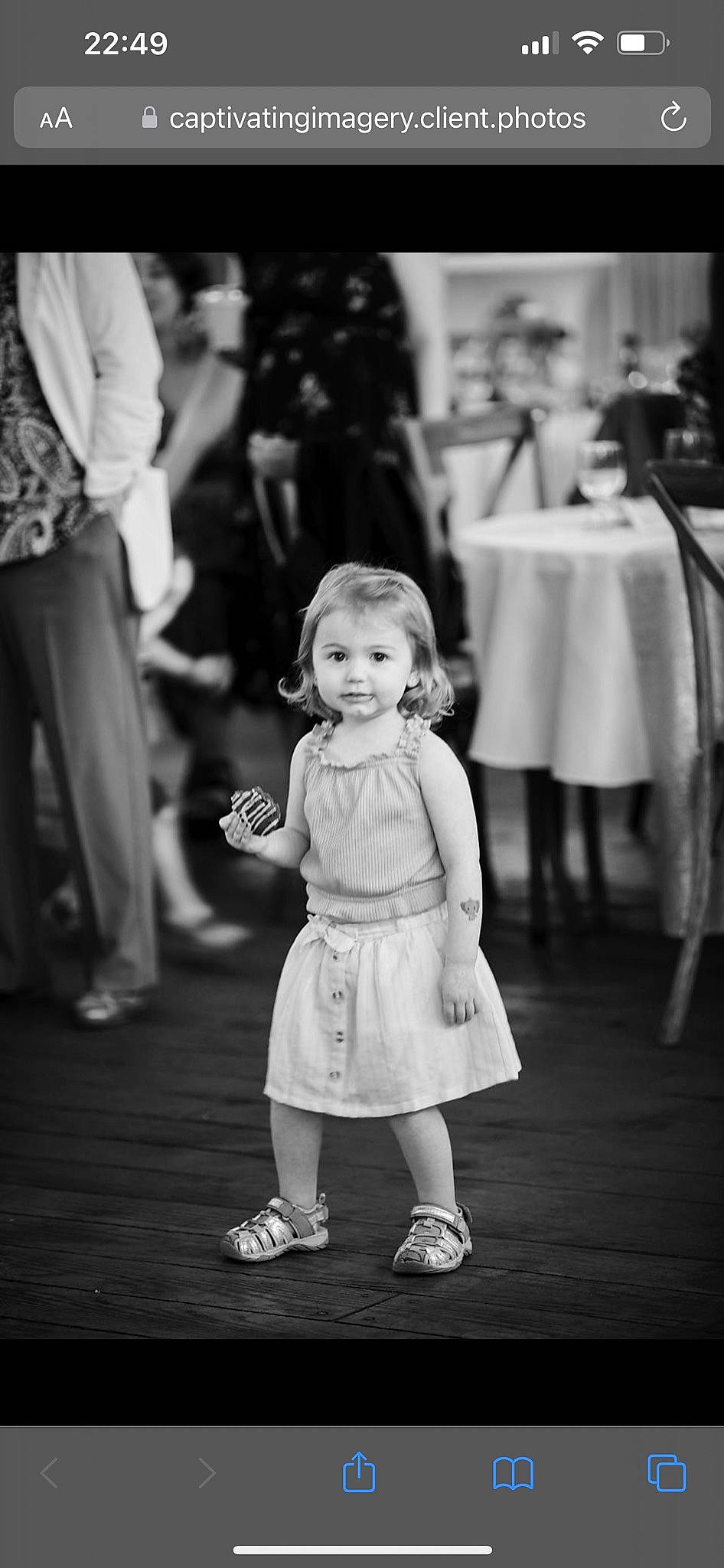 Gracie joined the competition — help win amazing prizes! black, black_and_white, child, dress, event, gesture, hand, happy, human, leg, monochrome, monochrome_photography, person, photograph, smile, snapshot, standing, style, table, toddler