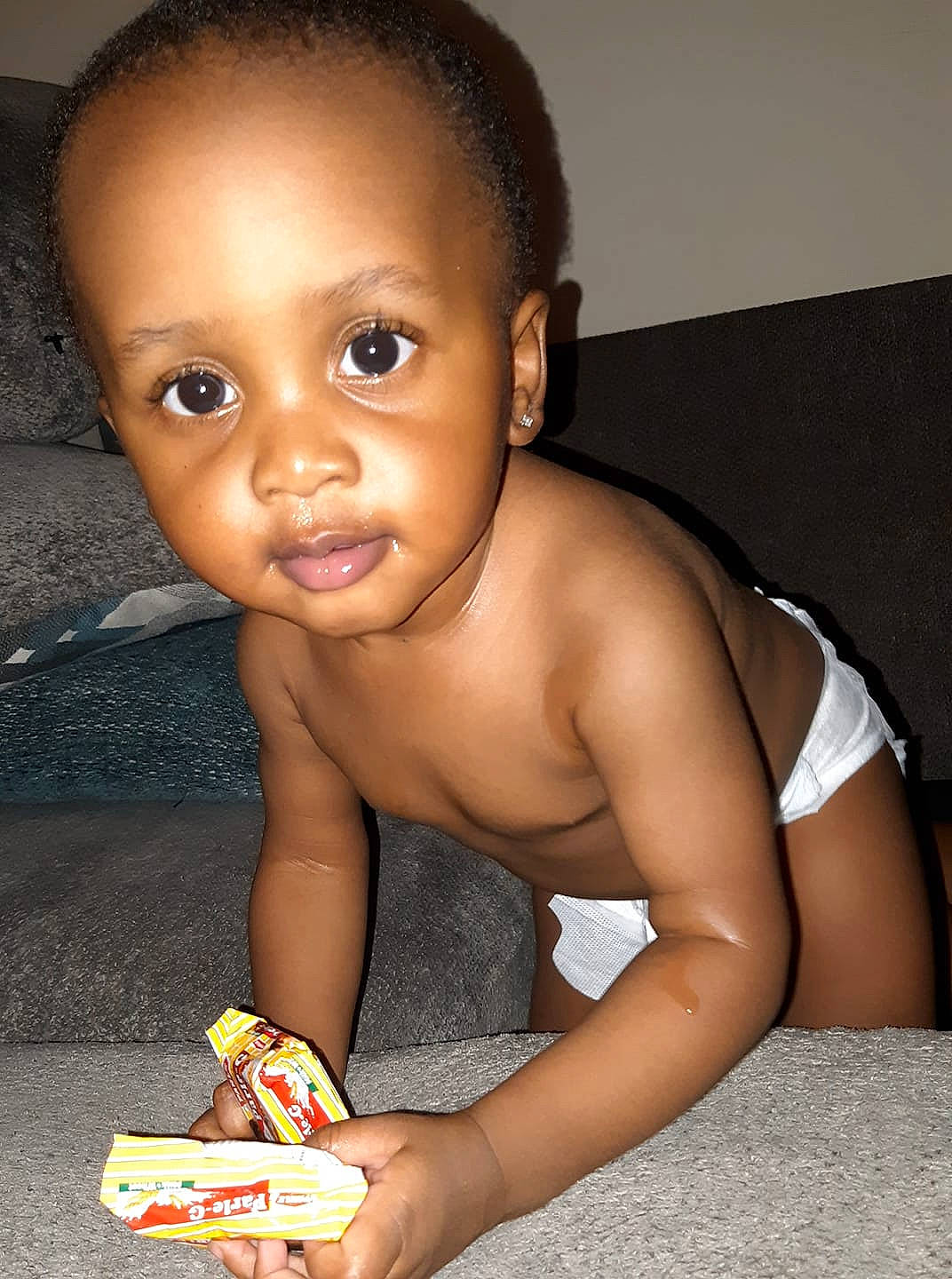 Kace is registered to the contest to win money with this photo: baby, black_hair, child, mouth, person, skin, toddler