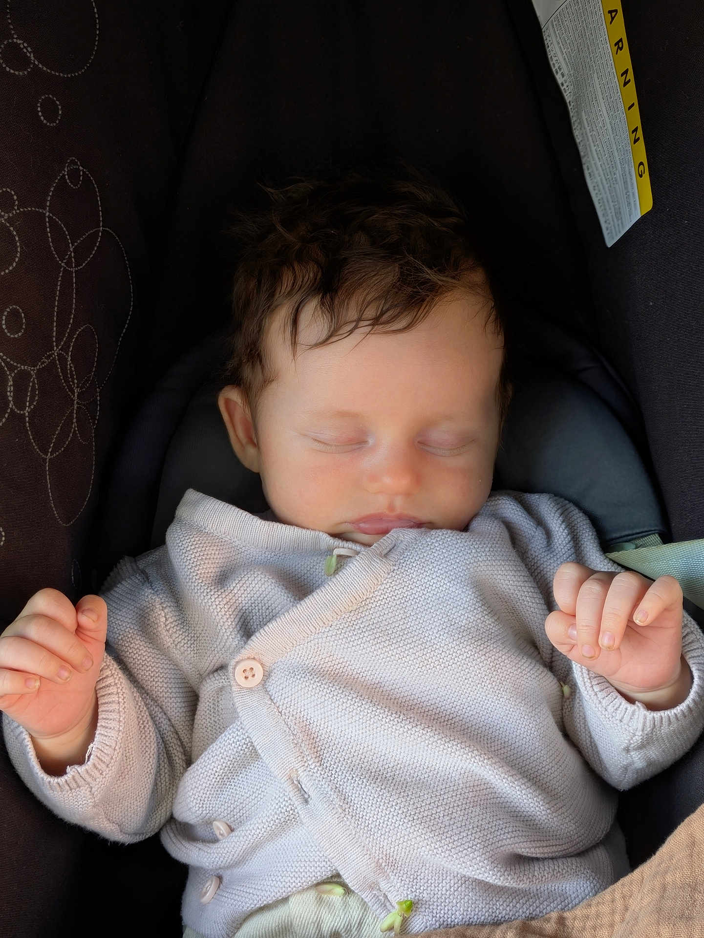 Aaron participe au concours pour gagner de l'argent avec cette photo : baby, sleeping, infant, car_seat, knit_cardigan, cozy, hands, face, closed_eyes, hair, child, cute, peaceful, soft_light, indoor, portrait, newborn, relaxing, comfort, small_fingers