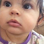 Evangeline is registered to the contest to win money with this photo: toddler, child, face, portrait, close_up, curly_hair, onesie, purple, animal_print, cute, indoor, soft_lighting, baby, young_child, expression, clothing, person, eyelashes, skin, head