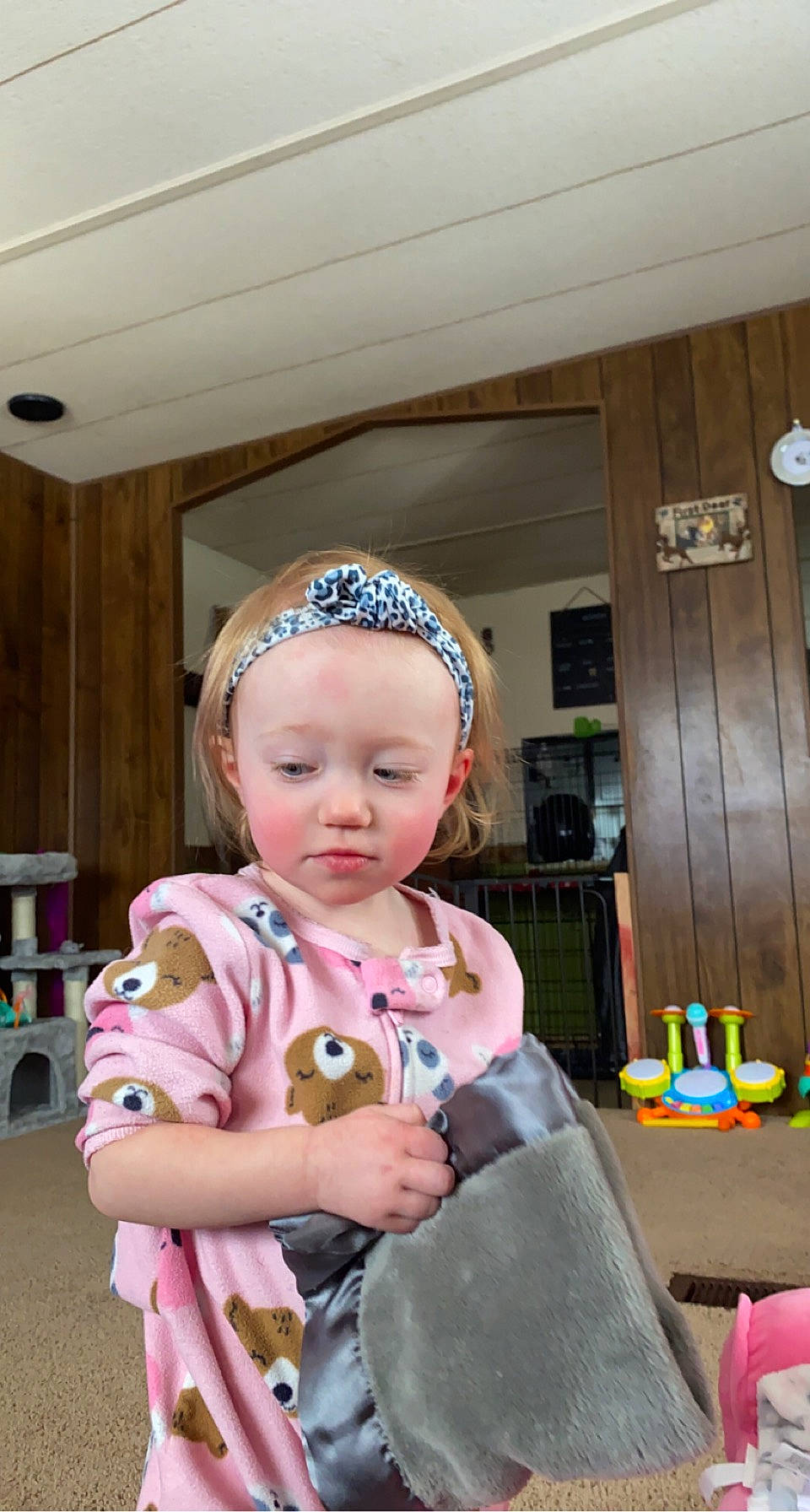 Elaina is registered to the contest to win money with this photo: baby, baby_products, baby_toddler_clothing, beanie, cap, child, costume, event, fashion_accessory, flooring, fun, hat, person, pink, play, room, sitting, toddler, vacation