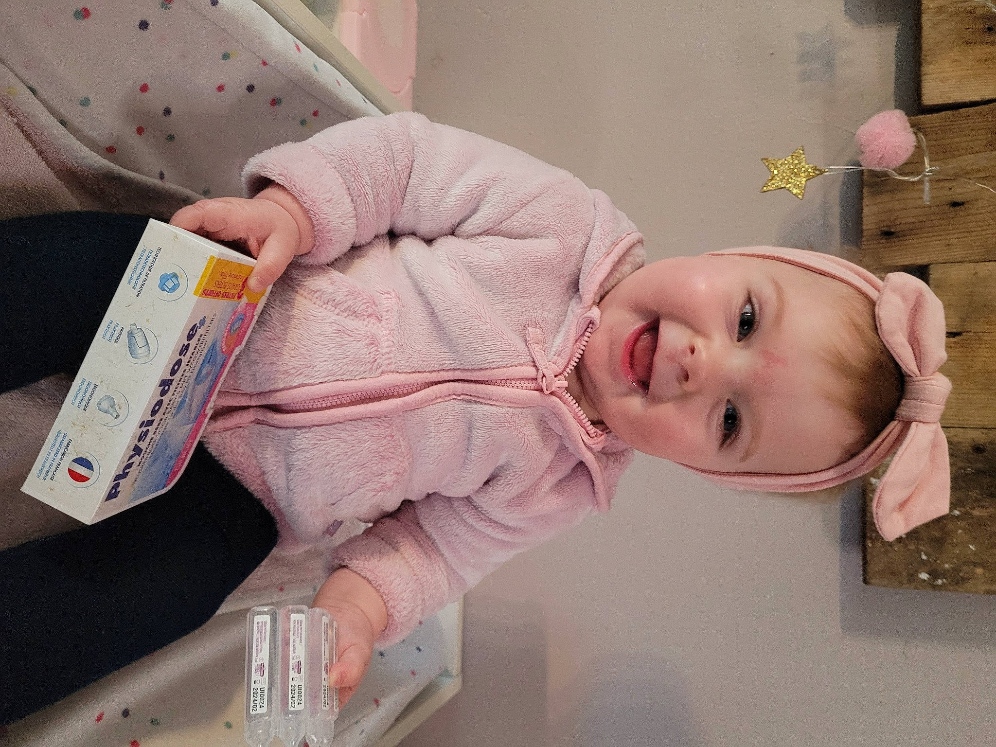 Maëlya a rejoint le concours — aidez-le/la à gagner de superbes lots ! baby, baby_laughing, baby_products, baby_toddler_clothing, baby_toys, cheek, child, drinkware, hairstyle, happy, mouth, nail, nose, person, pink, plastic_bottle, room, skin, smile, tableware