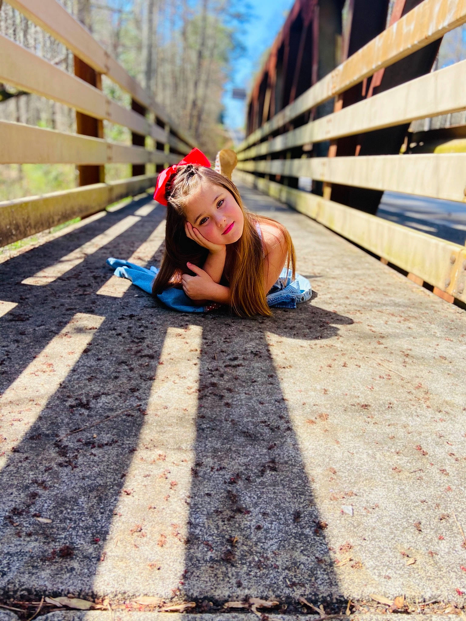 Mckenzie is registered to the contest to win money with this photo: asphalt, city, electric_blue, eyewear, floor, flooring, fun, grass, happy, landscape, leisure, person, public_space, recreation, road, road_surface, sand, sidewalk, soil, street_fashion