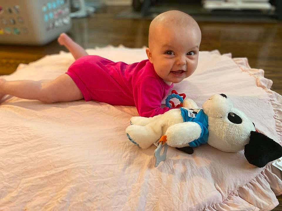 Alena joined the competition — help win amazing prizes! baby, child, crawling, fictional_character, floor, flooring, head, person, play, plush, skin, stuffed_toy, teddy_bear, toddler, toy, tummy_time