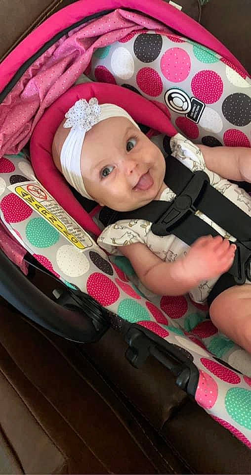 Alena is registered to the contest to win money with this photo: baby, baby_carriage, baby_in_car_seat, baby_products, car_seat, child, headwear, person, pink, product, toddler, toy