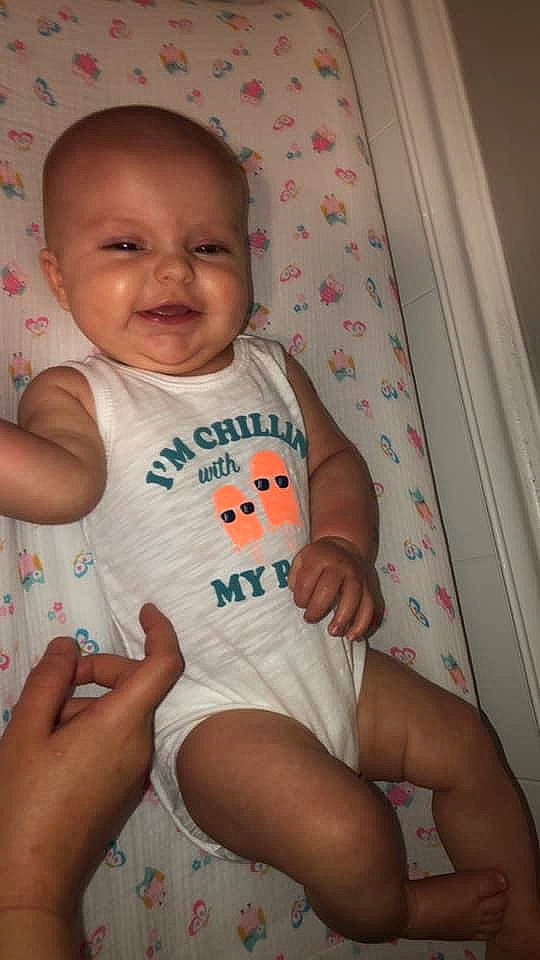 Alena joined the competition — help win amazing prizes! baby, baby_products, baby_toddler_clothing, cheek, child, diaper, finger, leg, person, product, sitting, skin, smile, thumb, toddler