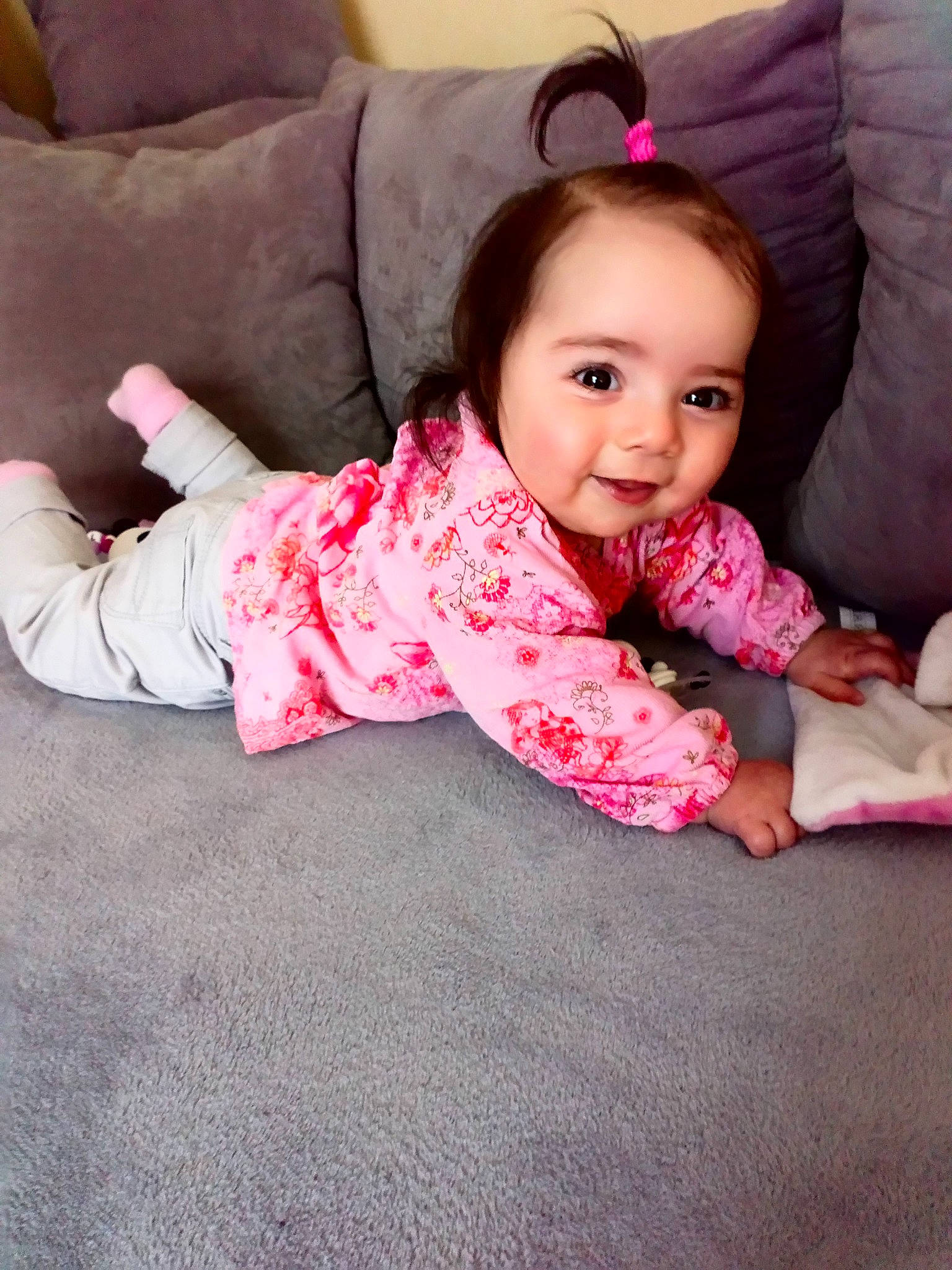 Yaëlle participe au concours pour gagner de l'argent avec cette photo : baby, beauty, cheek, child, daughter, ear, eye, face, head, lip, outerwear, person, pink, play, sitting, skin, smile, toddler