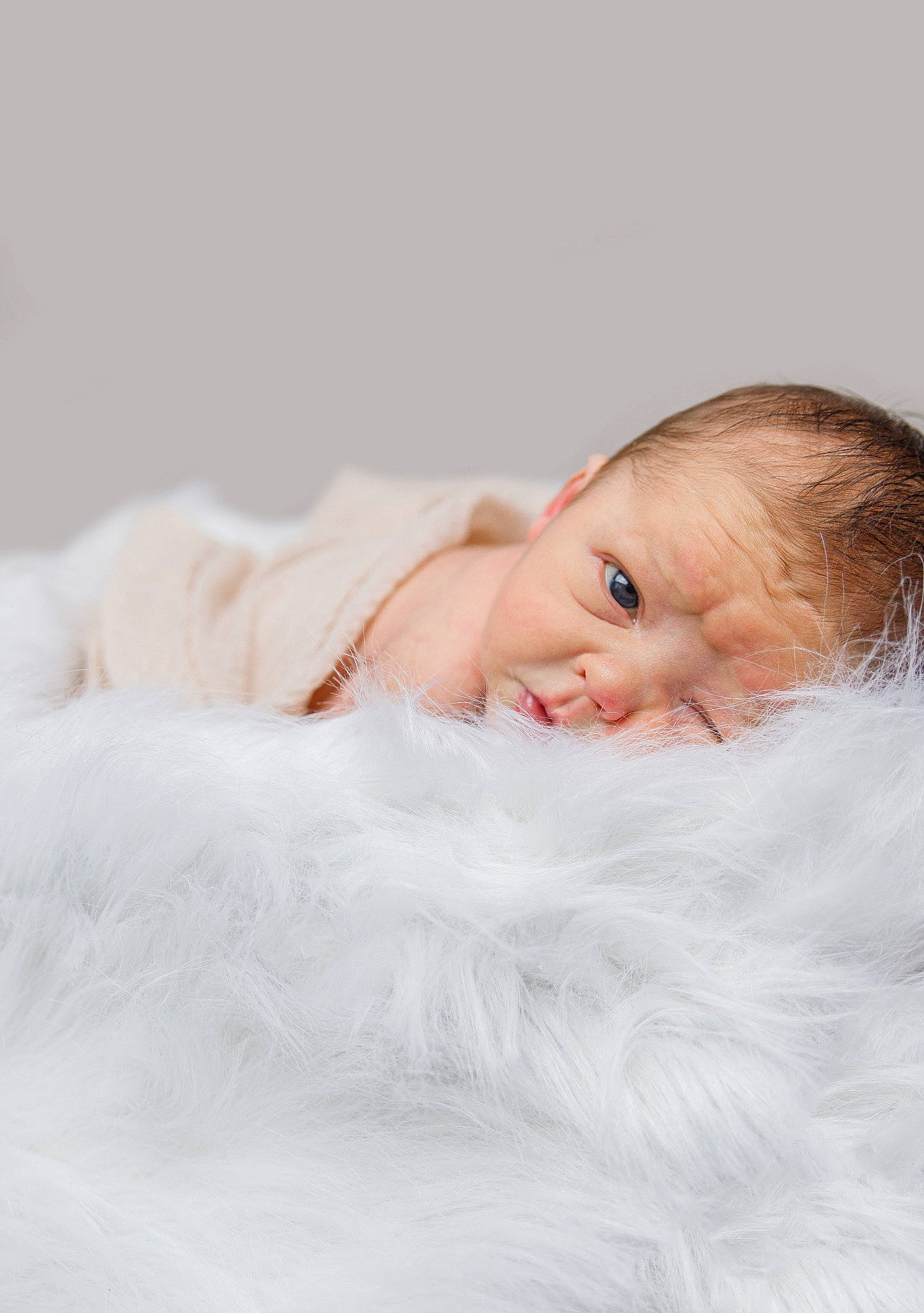 Auzanne participe au concours pour gagner de l'argent avec cette photo : baby, cheek, child, comfort, event, eyelash, fashion_accessory, flash_photography, fur, happy, linens, lip, natural_material, peach, person, portrait, portrait_photography, sleeve, smile, textile