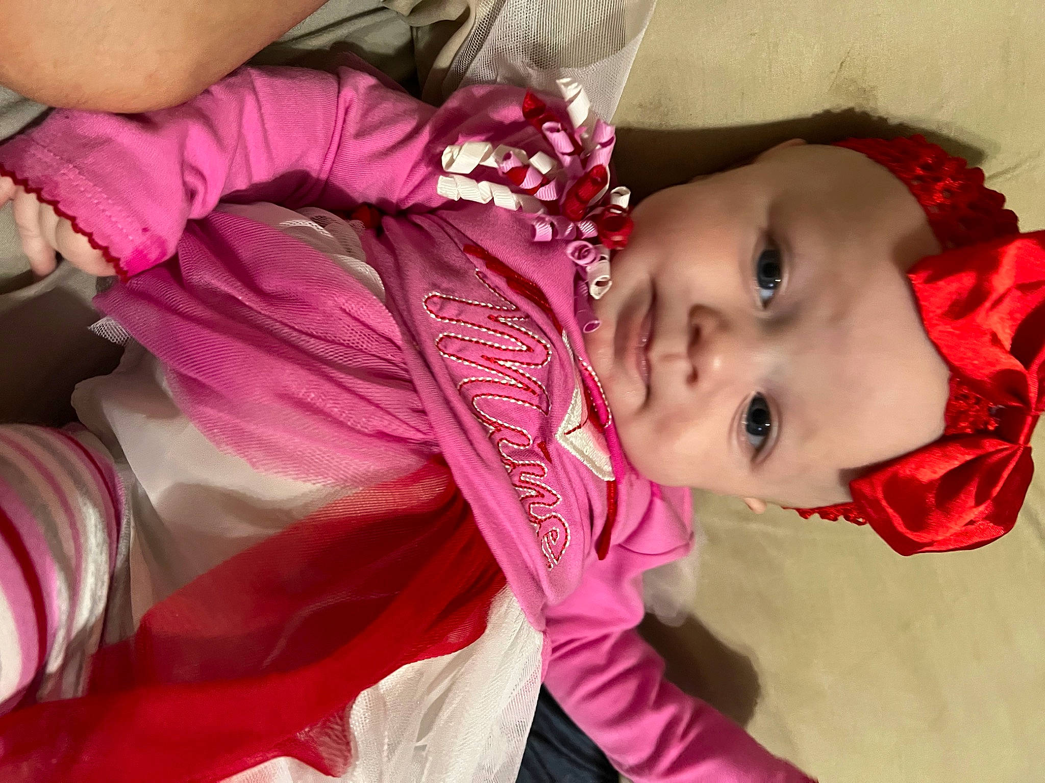 Aubriella is registered to the contest to win money with this photo: baby, black_hair, child, event, eyelash, fashion_accessory, happy, headwear, linens, magenta, pattern, person, pink, purple, sari, smile, toddler, tradition