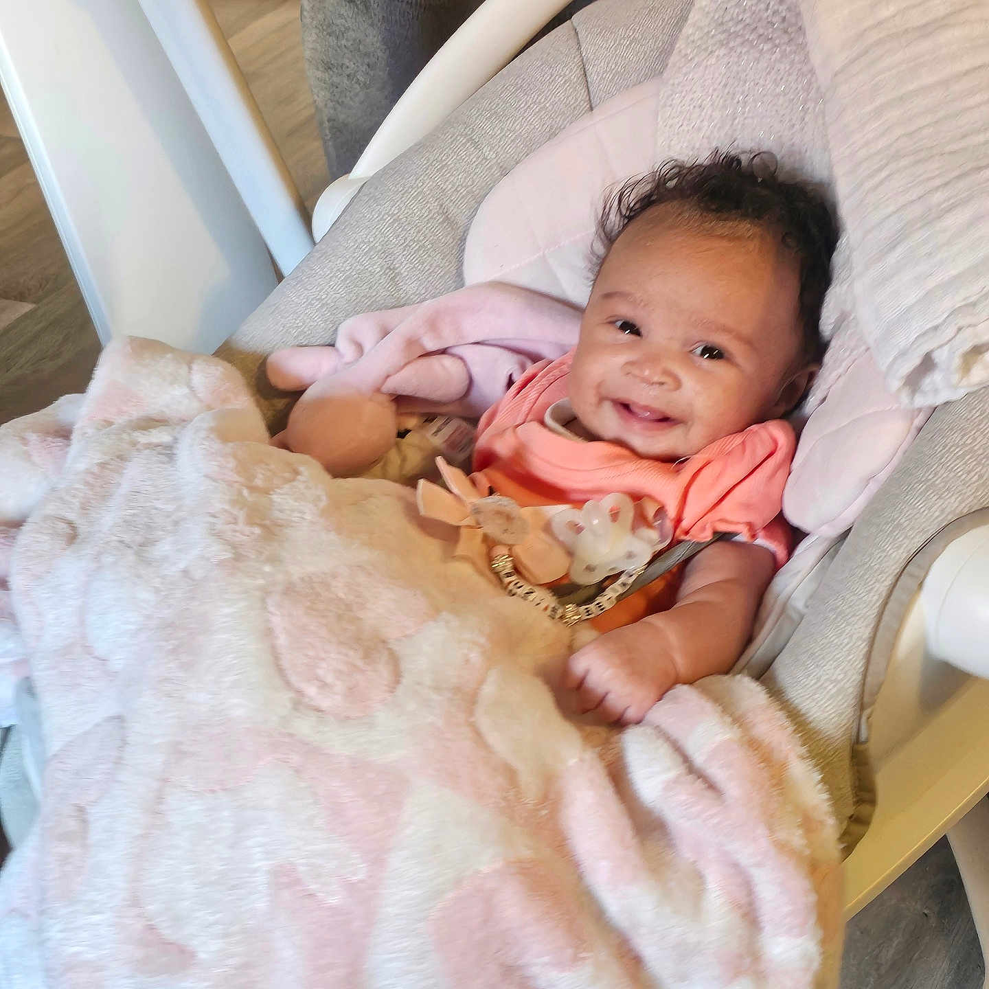 Suzie is registered to the contest to win money with this photo: baby, bed, blanket, clothing, crib, cushion, face, furniture, happy, head, homedecor, infantbed, newborn, person, photography, portrait, quilt, sleeping, smile, t_shirt