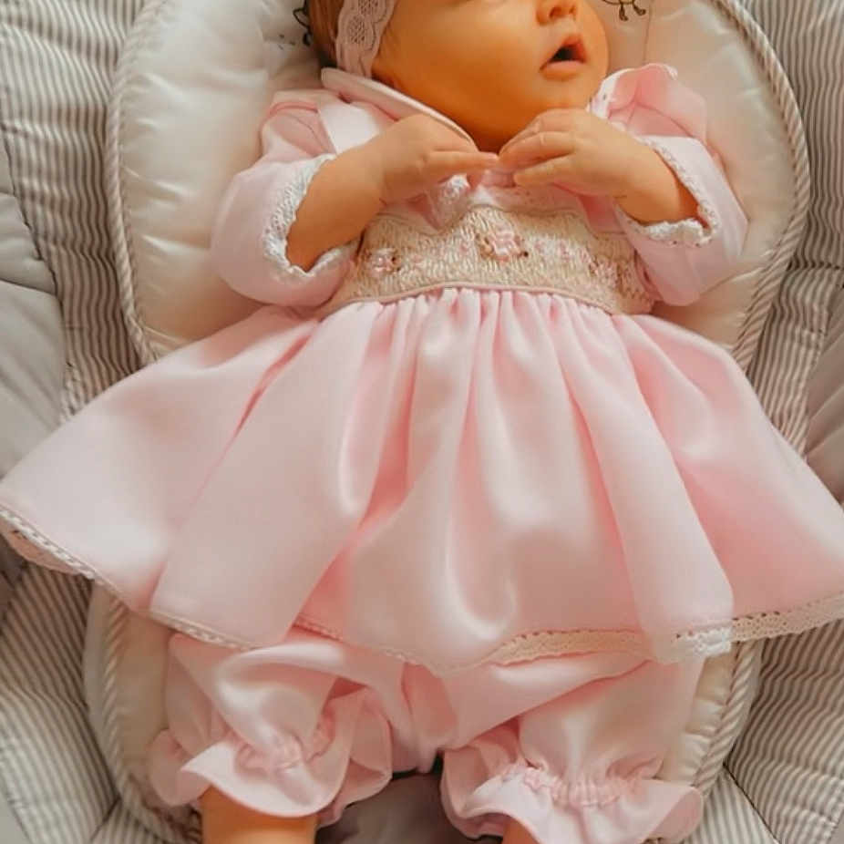 Alayiah-Sloan joined the competition — help win amazing prizes! apparel, baby, baby_seat, child, comfort, cushion, cute, expression, flower, headband, indoors, infant, newborn, pink_dress, portrait, resting, small_feet, small_hands, socks, soft_fabric