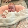 baby, sleeping, blanket, pillow, quilt, couch, infant, cozy, comfort, rest, child, face, indoor, peaceful, soft, clothing, cute, head, person, nap