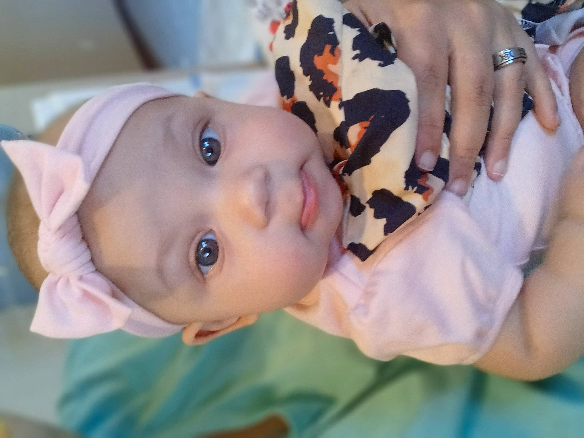 Sabrina is registered to the contest to win money with this photo: baby, baby_toddler_clothing, cheek, child, eye, eyelash, face, fun, gesture, grass, happy, hat, headwear, nose, person, plant, skin, sleeve, smile, toddler