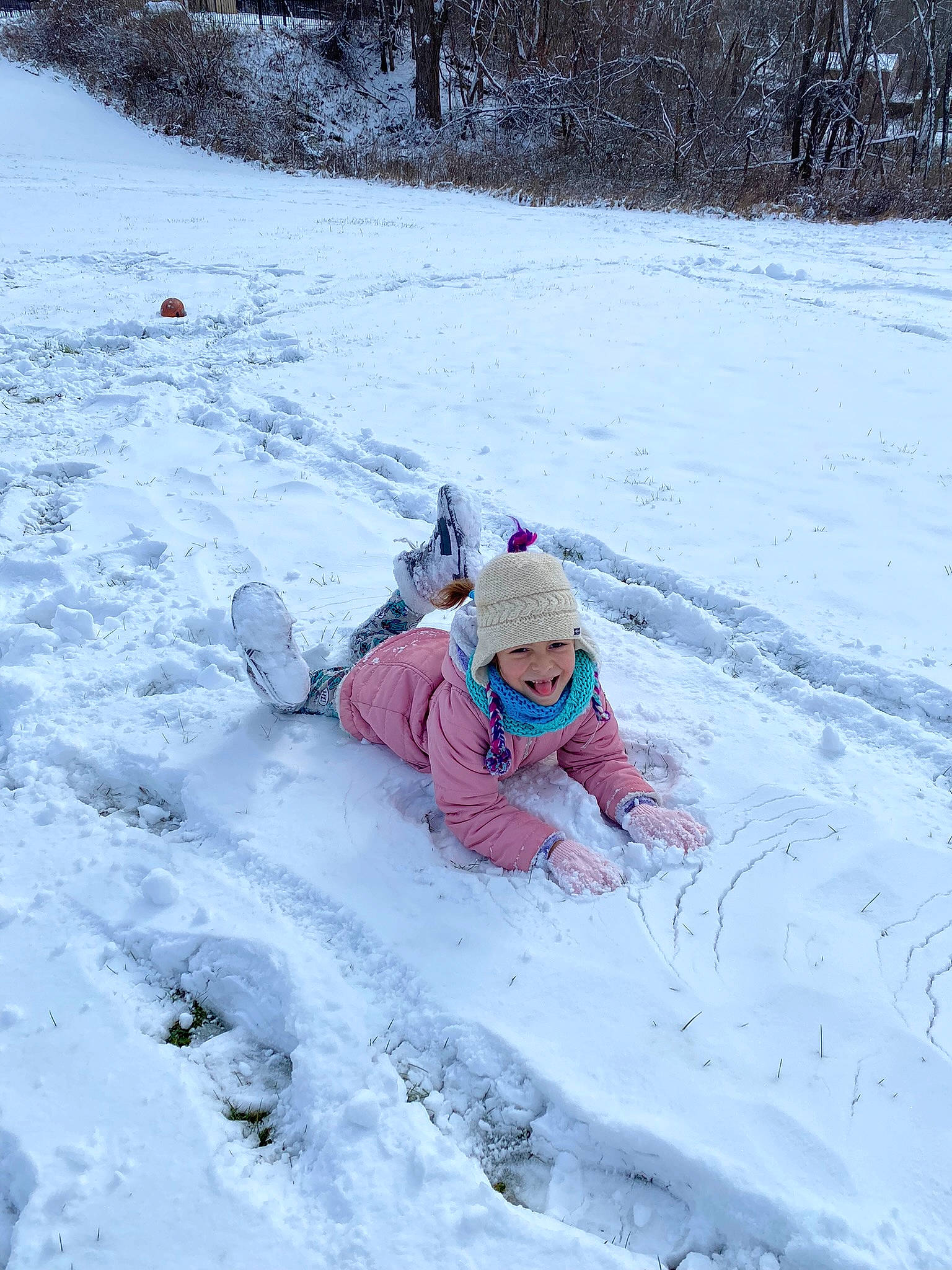 Mileena joined the competition — help win amazing prizes! child, electric_blue, freezing, fun, geological_phenomenon, grass, headwear, ice_cap, landscape, leisure, outdoor_recreation, person, plant, play, recreation, sled, sledding, slope, snow, toddler