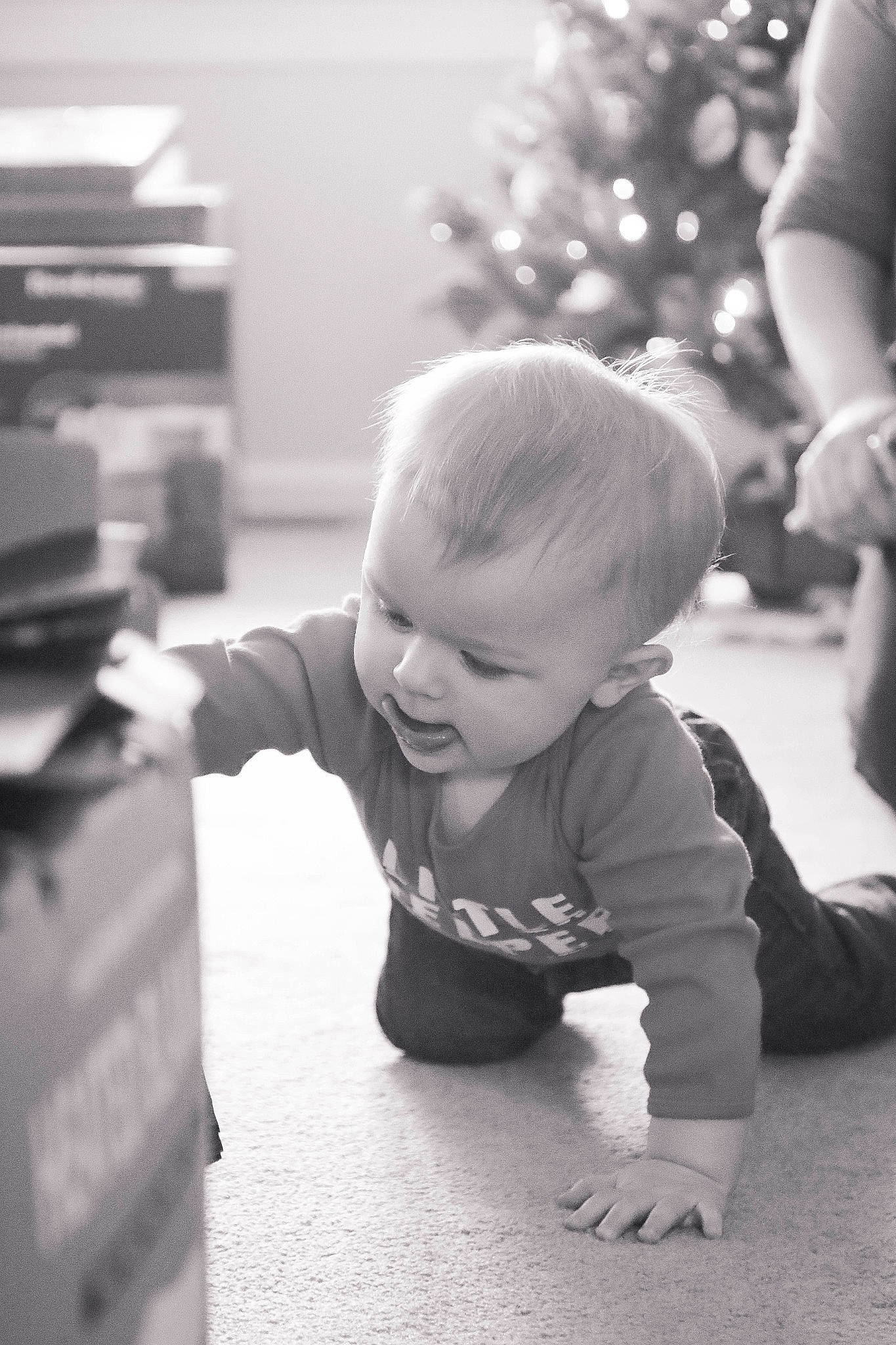 Abel joined the competition — help win amazing prizes! baby, baby_toddler_clothing, black_and_white, child, christmas_tree, crawling, event, flash_photography, flooring, fun, happy, hardwood, head, monochrome, monochrome_photography, person, room, sitting, standing, toddler