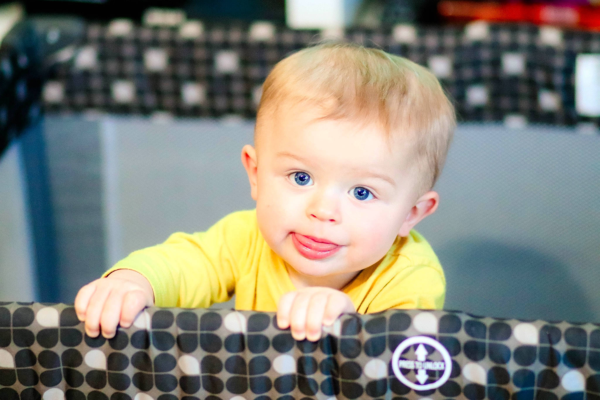 Abel is registered to the contest to win money with this photo: baby, baby_toddler_clothing, cheek, child, face, fun, happy, head, leisure, nose, organ, pattern, person, photograph, product, recreation, sitting, sleeve, smile, snapshot