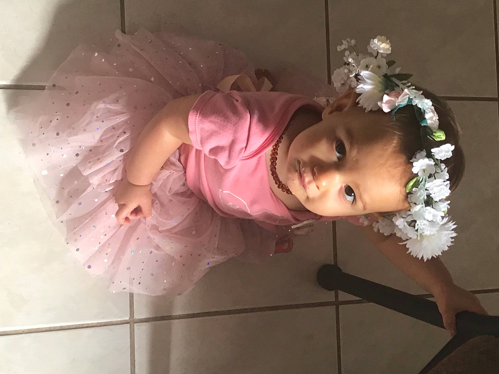 Adriana joined the competition — help win amazing prizes! baby, baby_toddler_clothing, beauty, child, costume, cut_flowers, dress, event, fashion_accessory, flash_photography, hair_accessory, happy, headgear, headpiece, magenta, person, pink, rose, smile, textile