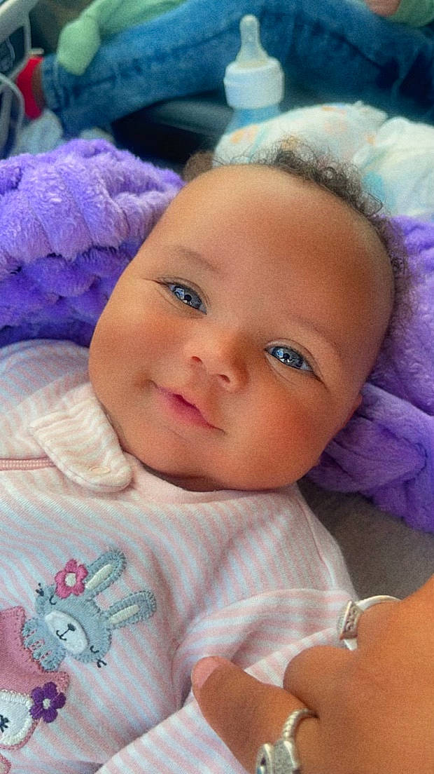 Daleena Harris joined the competition — help win amazing prizes! azure, cheek, chin, eye, eyebrow, eyelash, face, facial_expression, forehead, happy, head, iris, lip, mouth, nose, person, pink, purple, skin, sleeve