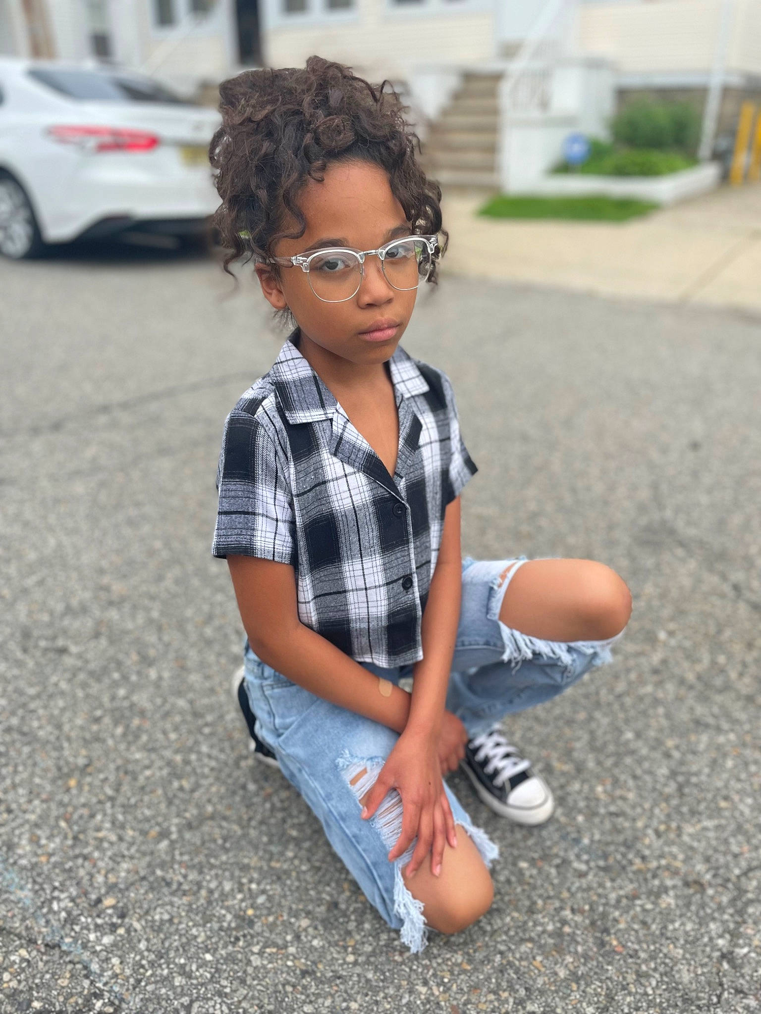 Kamilah-rose joined the competition — help win amazing prizes! asphalt, automotive_tire, child, denim, electric_blue, eyewear, footwear, glasses, hairstyle, person, plaid, public_space, shorts, sleeve, sneakers, style, t_shirt, tire, toddler, walking_shoe
