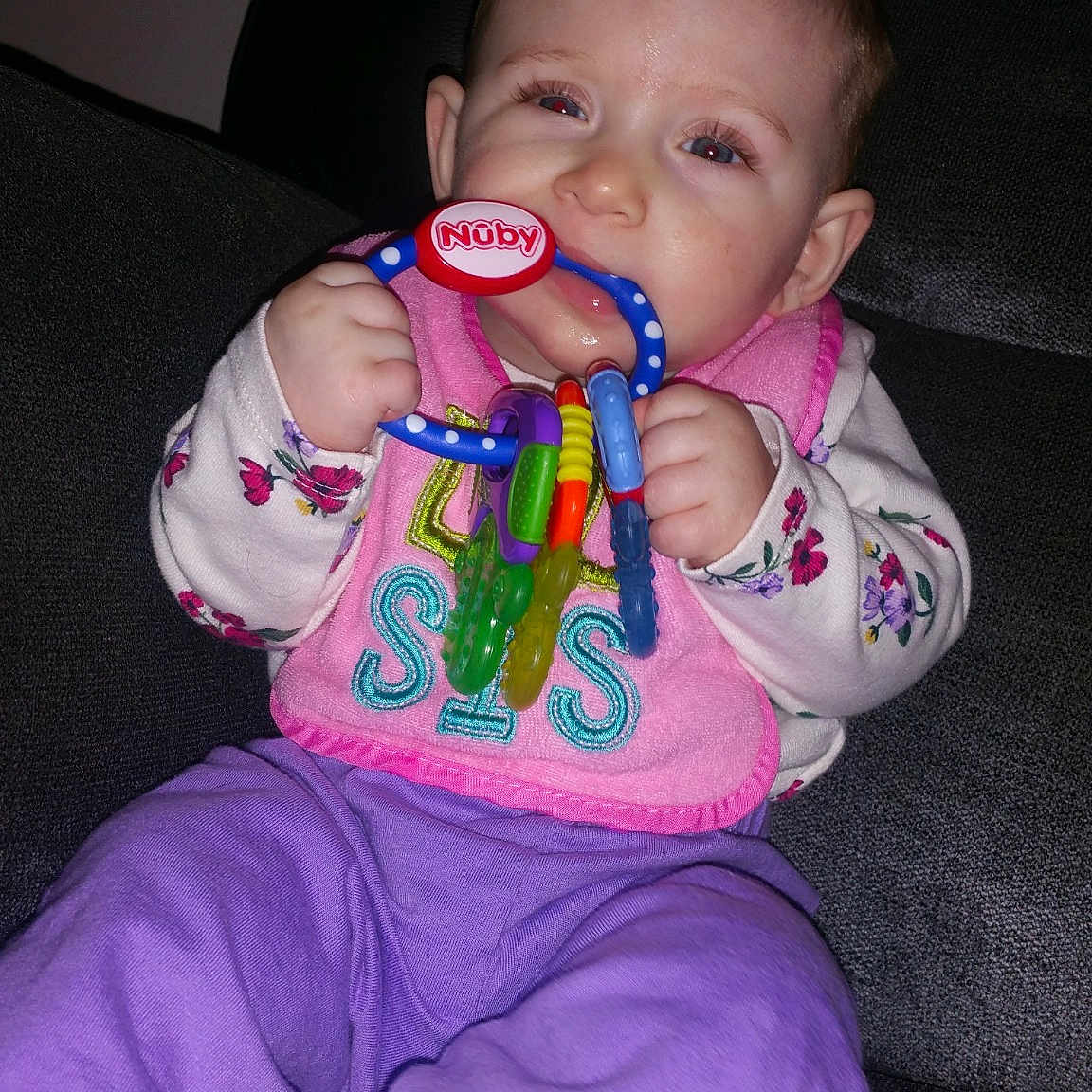 Adrianna joined the competition — help win amazing prizes! baby_products, cheek, child, cool, eye, fun, girl, infant, iris, mouth, organ, person, pink, play, product, purple, sitting, skin, smile, textile