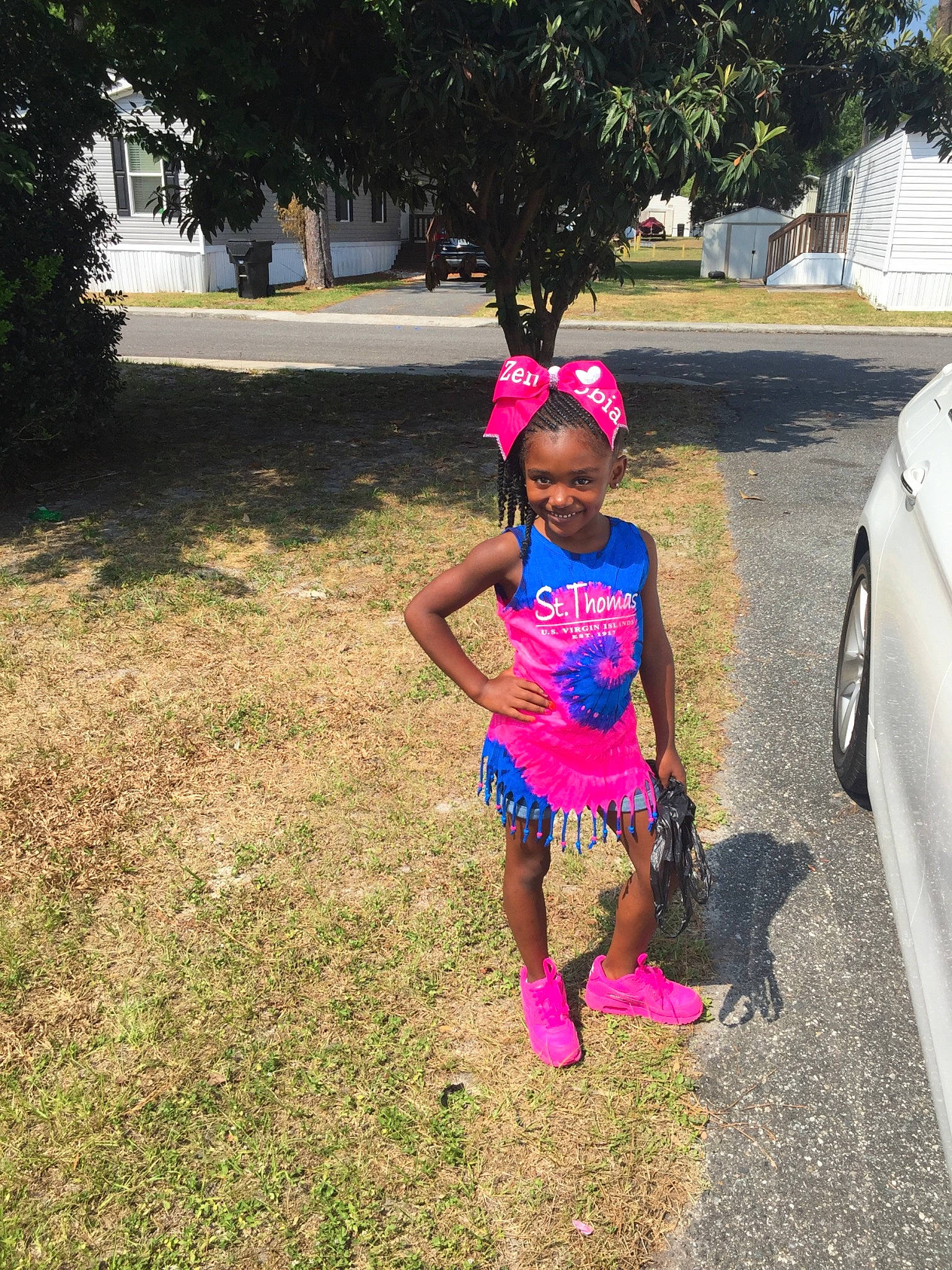 Zenobia joined the competition — help win amazing prizes! car, child, fun, grass, headgear, joy, person, personal_protective_equipment, pink, plant, play, recreation, smile, soil, style, summer, toddler, tree, vacation, vehicle