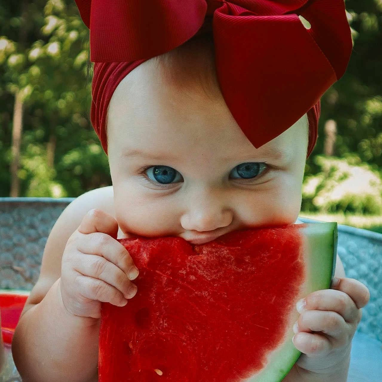 Remi is registered to the contest to win money with this photo: baby, bodypart, clothing, eating, face, finger, food, fruit, grass, hand, head, ketchup, melon, person, photography, plant, portrait, produce, summer, watermelon