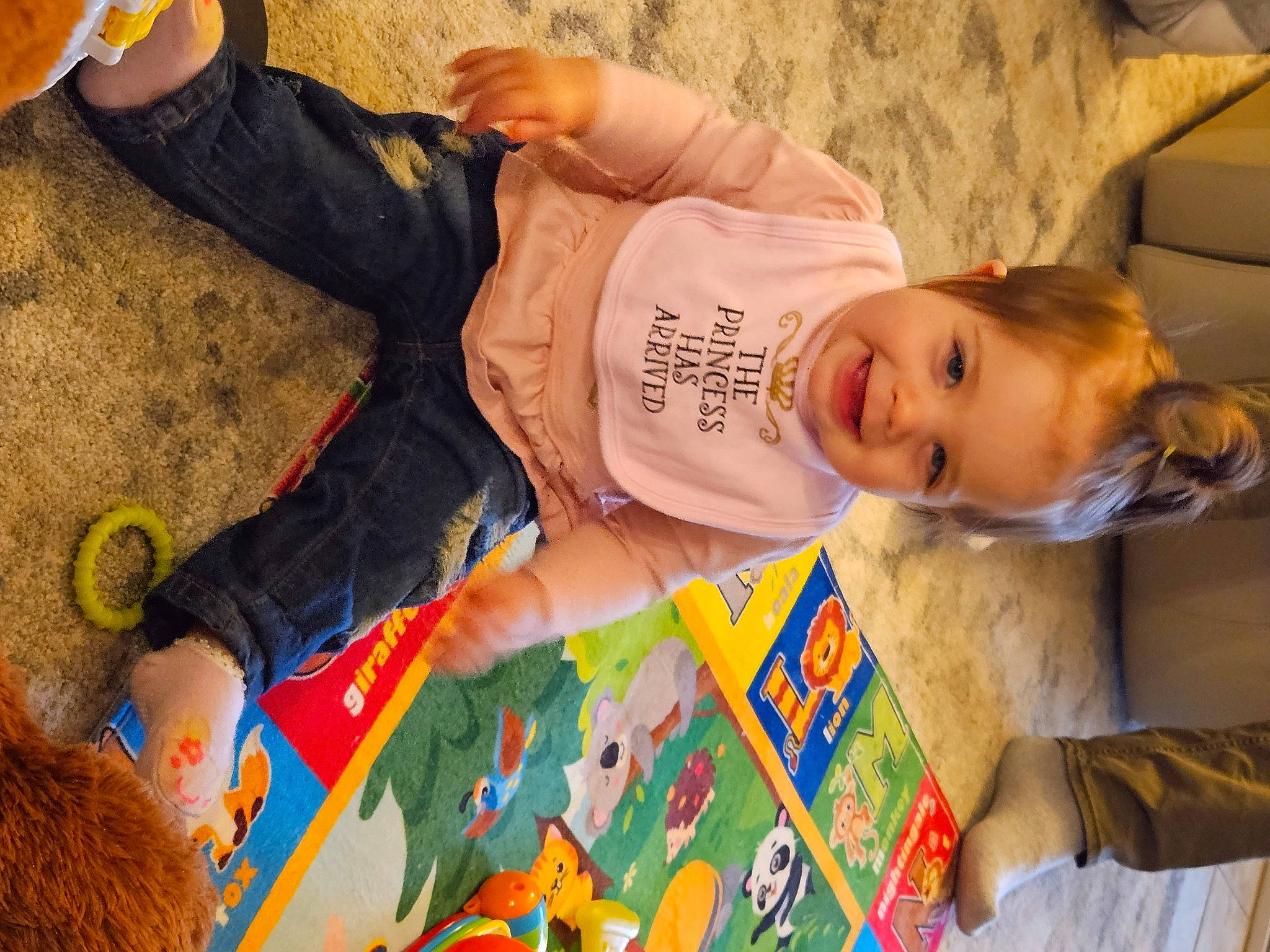 Elizabeth joined the competition — help win amazing prizes! art, baby, baby_toddler_clothing, child, flooring, fun, happy, joy, leisure, linens, orange, pattern, person, play, room, toddler, visual_arts, wood, yellow